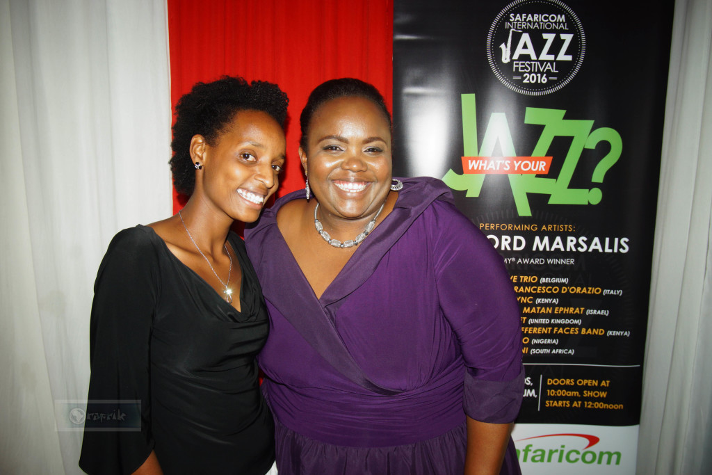 Nairobi orchestra Violinist Bernadette shares a smile with Jazz Vocalist kavutha