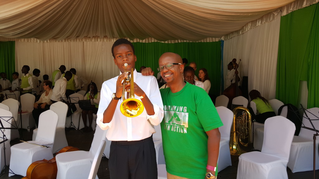 Dj D-lite with his son, his son is a member of the Safaricom Youth Orchestra