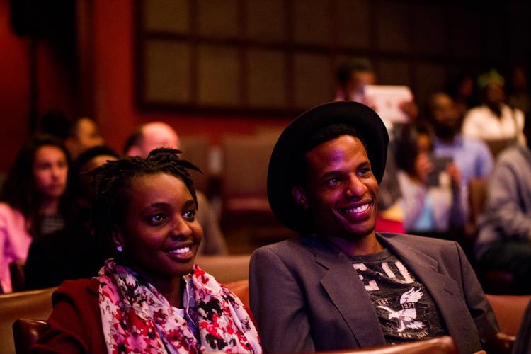 Audience members listening to good classical music