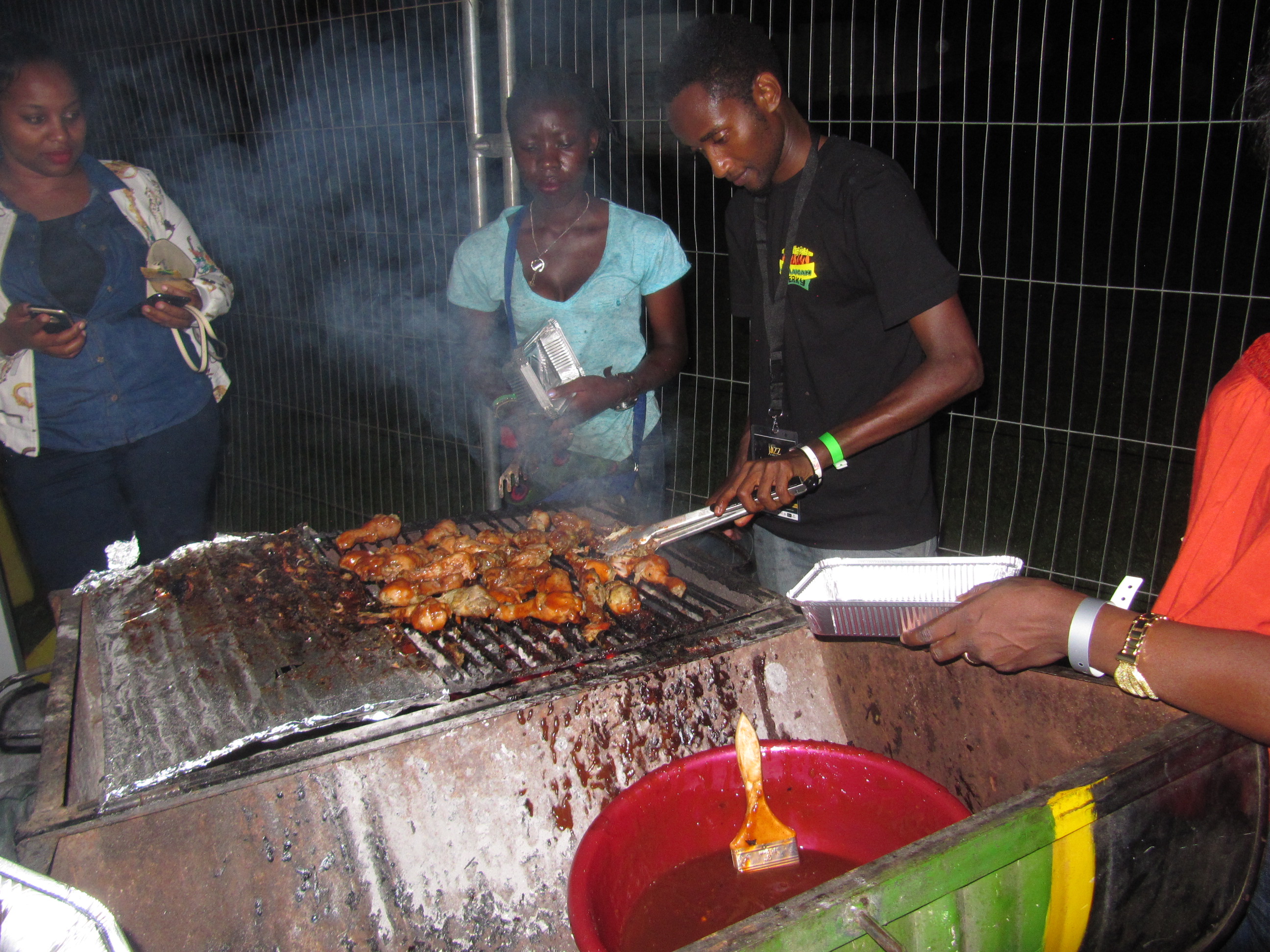 Ugandan Food is yummy too, some chicken choma on the grills as hungry fans await their turn