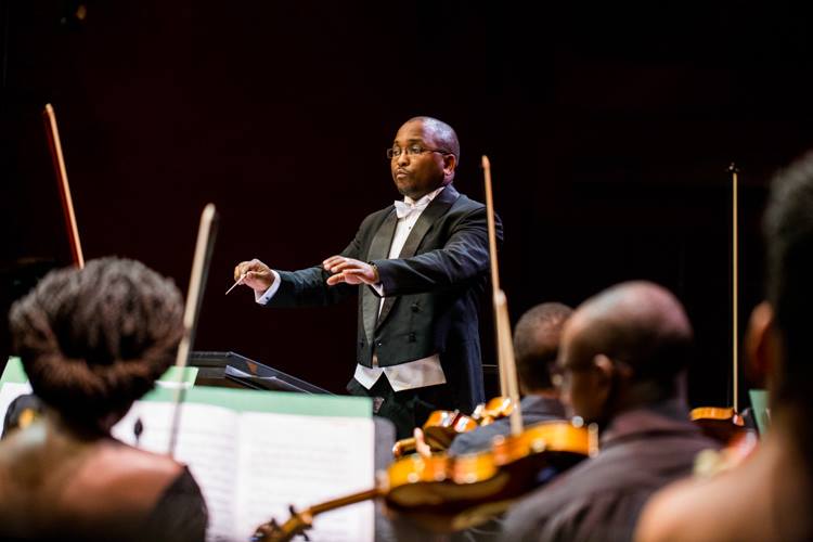 Duncan Wambugu conducting members of Nairobi Orchesttra