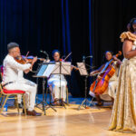 Mariah Gichu a troubadour, journeying with her music through time  